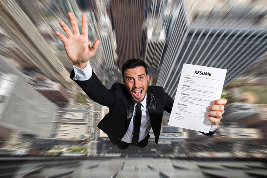 Man holding a resume